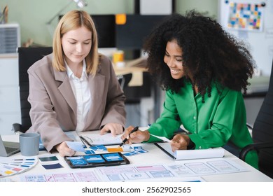 UX developer and ui designer brainstorming about mobile app interface wireframe design with customer breif and color code, User experience concept.