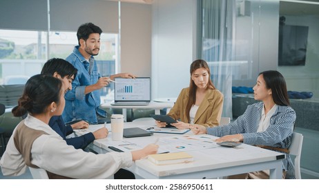 Ux Developer and Ui Designer brainstorming and Startup marketing team businesspeople discussion in office. Teamwork, Strategy, digital marketing Strategy Development User experience concept.
