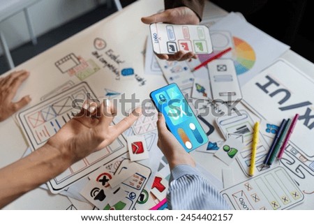 ux developer and UI designer team brainstorm together about designing application interface layout. Creative digital development agency. UX UI concept