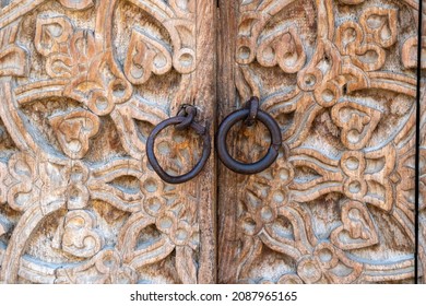 Uzbekistan, beautiful old carved wooden door.
