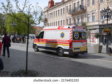 Uzhhorod, Ukraine - April 27, 2022: An Ambulance Responding To Emergency Call Driving Fast On Street In Motion Blur In Uzhhorod, Ukraine. Healthcare Concept