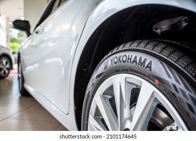 Uzhhorod. Ukraine September 15, 2021. Brand New YOKOHAMA Car Tires On A New White Car In The Cabin. 