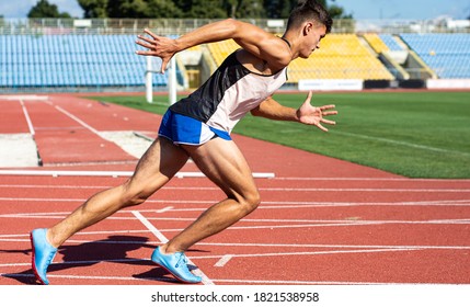 UZHHOROD, UKRAINE - SEPTEMBER 5, 2020: Male Teen Athlete Training On A Running Track On A Stadium. Male Runner Training On A Running Track In Uzhhorod, Ukraine