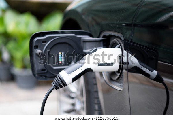 V Car or Electric\
car at charging station