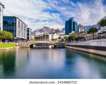 V and A Waterfront's canal and Cape Town city with the table mountain in the background, Cape Town, South Africa - Powered by Shutterstock