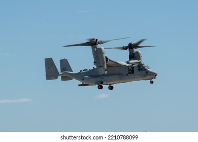 V22 Osprey Flying In Clear Blue Skies In Vertical Takeoff Configuration. Photo Taken In San Diego California On 9-23-22.