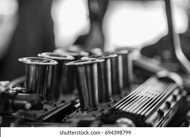 V8 engine intakes in Black and White.
