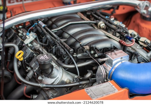 V8 under the bonnet\
of performance car