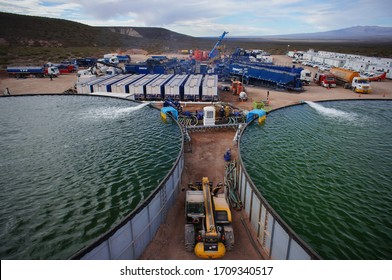 Vaca Muerta, Argentina, November 23, 2015: Extraction Of Unconventional Oil. Water Tanks For Hydraulic Fracturing.