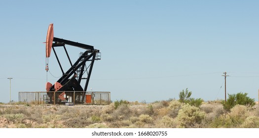 Vaca Muerta Field. One Oil Pump Jack Pumping Crude Out Of The Ground In Neuquen, Argentina