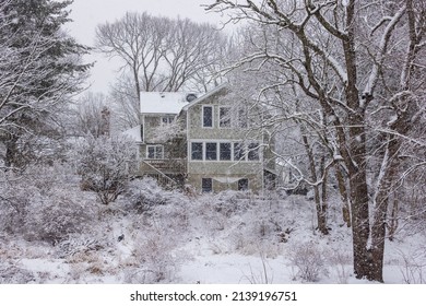 Vacant Home In Snow Covered Winter Landscape