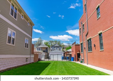 Vacant Residential Lot With Green Grass In The University Village Neighborhood Of Chicago 