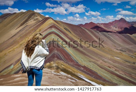 Similar – Woman on the top of the Rainbow Mountain, Peru.