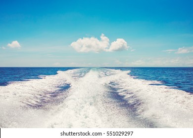 Vacation Holiday Concept Background Wallpaper. Background Water Surface Behind Of Fast Moving Motor Boat In Vintage Retro Style