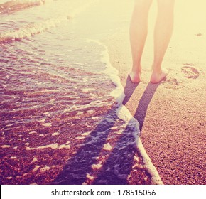 Vacation Holidays.Feet Closeup Of Relaxing On Beach In Sunny Summer Day.