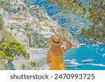 Vacation in Italy. Woman tourist enjoying vacation sun and views. Inspiration Positano, Amalfi coast