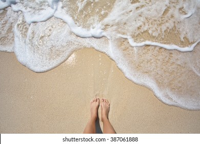 Vacation On Ocean Beach, Feet On Sea Sand