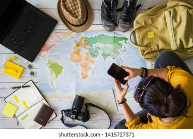 Vacation Travel Planning Concept With Map. Overhead View Of Equipment For Travelers. Travel Concept Background, Young Asian Woman. Concept On Vacation Trip, Travel Holiday, Summer.