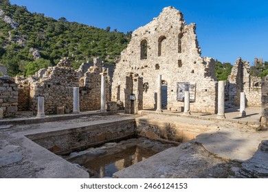 Vacation in Turkey: Olympos, ancient, archaeological, historical sunken city as a destination near Antalya - old wall remains - Powered by Shutterstock