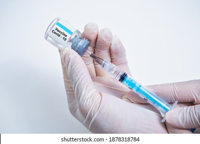 Vaccination against the new Corona Virus Vacine-Covid19: A syringe being drawn up with Vacine-Covid 19. 