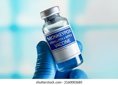 Vaccination for booster shot for Smallpox and Monkeypox (MPXV). Doctor with vial of the doses vaccine for Monkeypox (MPXV) disease