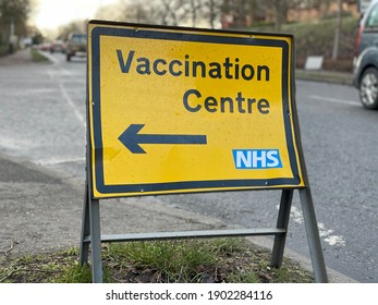 Vaccination Centre Sign In Letchworth Garden City, UK. Road Sign For NHS Covid Vaccination Centre, Set Up To Help Health Workers Distribute The Coronavirus Jab.