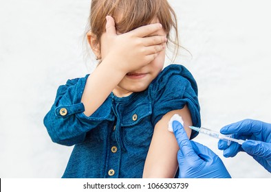 vaccination of children. An injection. Selective focus. - Powered by Shutterstock