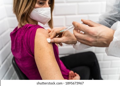 Vaccination Healthcare Concept - Hands Of Unknown Doctor Or Medic Hold A Syringe Preparing A Shot Of Corona Virus Covid-19 Hpv Or Flu Vaccine For Patient Arm - Copy Space Close Up