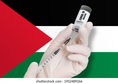 Vaccination In Palestine. Vaccine To Protect Against Covid-19 On Background Of National Flag.