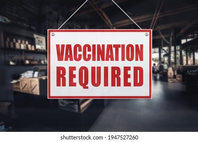 Vaccination Required Sign at a restaurant or bistro. Proof or vaccination required to enter a shop or business establishment. - Shutterstock ID 1947527260