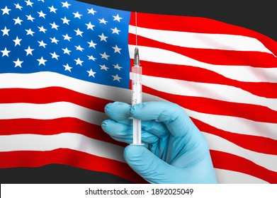 Vaccination In United States Of America. Vaccine To Protect Against Covid-19 On Background Of National Flag.