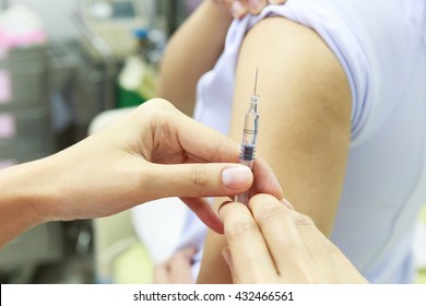 Vaccination for women in vaccine room.Selective focus.Medical concept.
