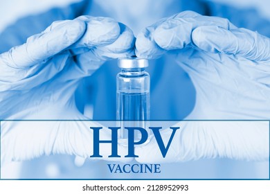 Vaccine Against Human Papilloma Virus, HPV. Medical Ampoule In The Hands Of A Doctor. Vaccination Awareness Concept. Toned Image. Medical Poster. High Quality Photo