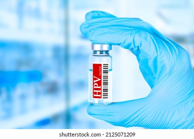 Vaccine Against Human Papillomavirus, HPV. Medical Ampoule In The Hands Of A Doctor. Vaccination Awareness Concept. Medical Poster. High Quality Photo