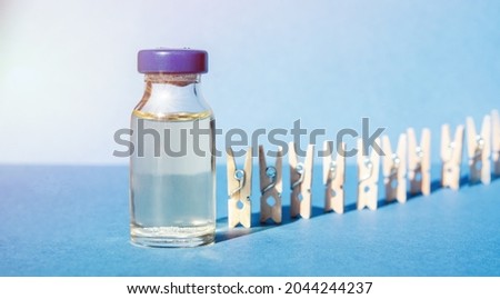  vaccine ampoule, concept of mass vaccination of the population against covid 19 Pro-Vaccine vs Anti-Vaccine problem