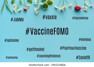 Vaccine FOMO Hashtag. Fear Of Missing Out, Vaccine Envy. Uncertainty During Covid-19 Pandemics. Cloud Of Related Concepts And Feelings Typed Around. Layered Duotone Color Paper Background With Wild