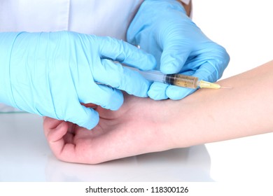 Vaccine Injection In Hand Isolated On White