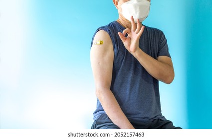 Vaccine Medical Health.Asian Thai Man Getting Vaccinated Immunity And Show Symbol.vaccine Program, Recommended Inoculation, Vaccination.Coronavirus Protect Concept.