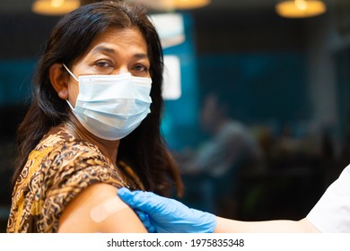 Vaccine Medical.Asian Indian Old Women Getting Vaccinated Immunity In Clinic.vaccine Program, Recommended Inoculation, Vaccination, Vaccine Volunteer Or Vaccinated Patient.Coronavirus. India Old Woman