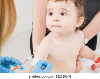 Vaccine Vaccination Child Baby Doctor Injection Pediatrician Injecting Arm Health Immunization Hand Hospital Needle Syringe Concept - Stock Image