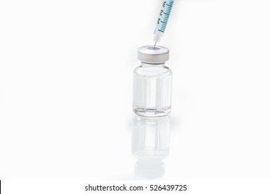 Vaccine In Vial With Syringe