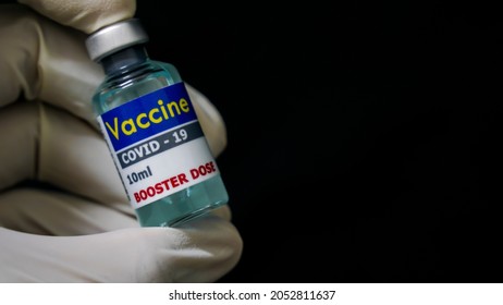 Vaccines Covid19 For Booster Dose In Bottle With Hand.CoronaVac Is A Vaccine That Aims To Protect Against COVID-19.mRNA Type Vaccine.Viral Vector Vaccine Type.Inactivated Vaccine.