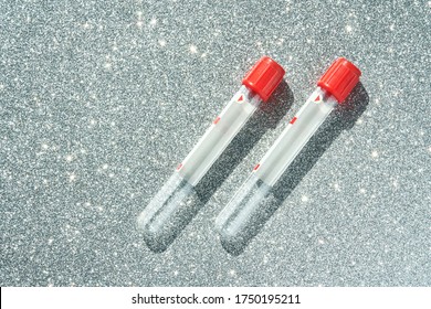 Vacutainer For Collecting Blood Material In Laboratory. Medical Tubes To Diagnostic Test Covid, Dna, A1c Or Hiv Analysis. Hospital Research The Virus Concept. Top View