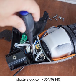 Vacuum Cleaner Disassembled For Repair Malfunctioning On Work Table