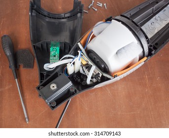 Vacuum Cleaner Disassembled For Repair Malfunctioning On Work Table