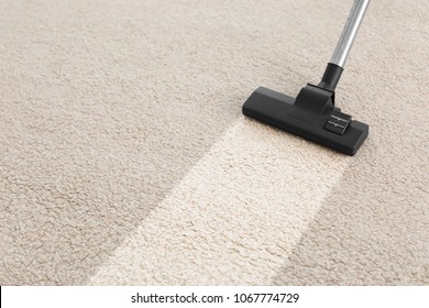 Vacuum Cleaner On Carpet