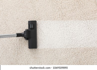 Vacuum cleaner on carpet