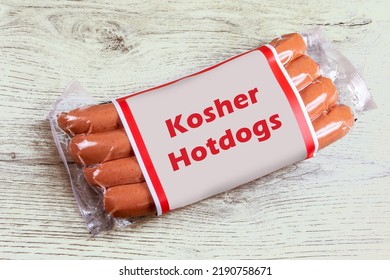 A Vacuum Package Of 4 Hotdogs With A Generic Kosher Hotdogs Label