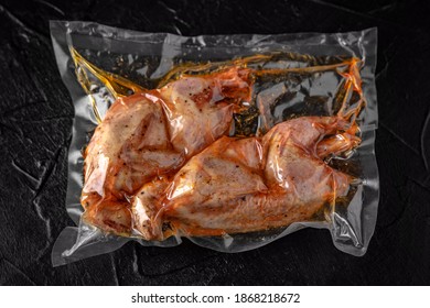 Vacuum packed marinated quail, ready to cook. Semi-finished product for restaurant and home. Food delivery.