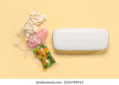 Vacuum sealer machine for food with chopped vegetables, mushrooms and meat in packs on yellow background - Powered by Shutterstock